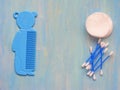 Baby Toiletry Items on blue wooden background with copy space Royalty Free Stock Photo