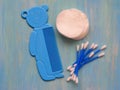 Baby Toiletry Items, tools used for babies on blue wooden background Royalty Free Stock Photo