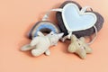 Baby toy with a heart mirror and star, rainbow and rhinoceros.