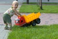 Baby with toy truck Royalty Free Stock Photo