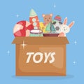 Baby toys in carton box Royalty Free Stock Photo