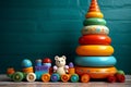 Baby toys create a whimsical scene on a neutral canvas