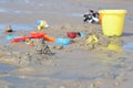 The beach is full of children`s toys. Royalty Free Stock Photo