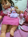Baby toys three dolls showing love of girls for dolls Royalty Free Stock Photo