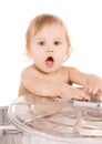 Baby in trash can Royalty Free Stock Photo