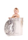 Baby in trash can Royalty Free Stock Photo