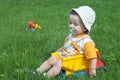 A baby in the truck on the grass Royalty Free Stock Photo