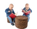 Baby twins reading book