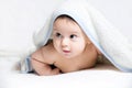 Baby under white towel Royalty Free Stock Photo