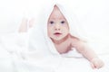 Baby under a white towel