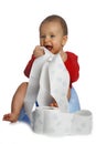 Baby with unrolled papper Royalty Free Stock Photo