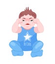 Baby is upset, crying, sitting in children`s clothes on floor. Royalty Free Stock Photo