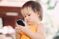 A baby using cell phone