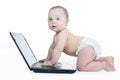 Baby using laptop over white background