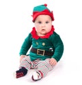Baby Wearing Elf Outfit - Babies First Christmas