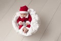 Baby Wearing a Santa Suit Royalty Free Stock Photo