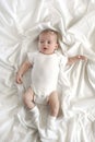 Baby on White Blanket