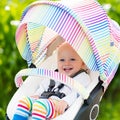 Baby in white stroller Royalty Free Stock Photo