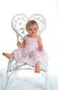 Baby in White Wicker Chair Royalty Free Stock Photo