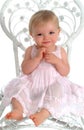 Baby in White Wicker Chair Royalty Free Stock Photo