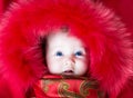 Baby in a winter jacket Royalty Free Stock Photo