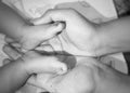 Baby& x27;s tiny feet in father& x27;s hand Royalty Free Stock Photo