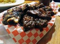 Babyback ribs in a plastic plate ready to eat