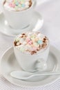 Babyccino - sugar free warm milk with milk foam for kids Royalty Free Stock Photo