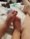 Babys feet little piggy toes Royalty Free Stock Photo