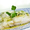 Bacalao al pil-pil, a typical spanish recipe of codfish Royalty Free Stock Photo