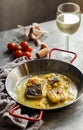 bacalao al pil pil, salted cod in emulsified olive oil sauce, spanish cuisine Royalty Free Stock Photo
