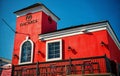 Bacardi store building with red walls on blue sky Royalty Free Stock Photo