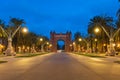 Bacelona Arc de Triomf at night in the city of Barcelona in Catalonia, Spain. The arch is built in reddish brickwork in