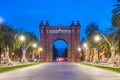 Bacelona Arc de Triomf at night in the city of Barcelona in Catalonia, Spain. The arch is built in reddish brickwork in the Neo-