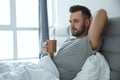 Bachelor man daily routine single lifestyle morning concept drinking coffee