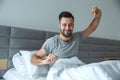 Bachelor man daily routine single lifestyle morning concept awakening gymnastic