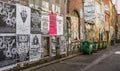 Back alley plastered with event posters and graffiti, Melbourne, Australia