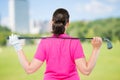 Back is athletes with equipment for playing golf Royalty Free Stock Photo