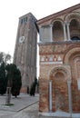 Back and bell tower of the cathedral of Murano in the municipality of Venice in Veneto (Italy)