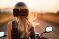 Back of blonde biker girl in a leather jacket and helmet on a motorcycle. Generative AI Royalty Free Stock Photo