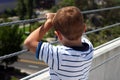 Back of boy's head looking at view