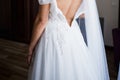 Back of the bride in wedding dress in the morning Royalty Free Stock Photo