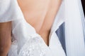 Back of the bride in wedding dress in the morning Royalty Free Stock Photo