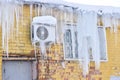 The back of the building is air-conditioned cafe on the wall covered with a thick layer of icicles