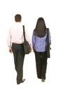 Back of business people walking Royalty Free Stock Photo