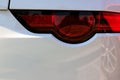 Back car Lights close up. White sports car closeup. Jaguar F-type Royalty Free Stock Photo