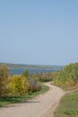 Back country road on the Canadian prairies in fall Royalty Free Stock Photo