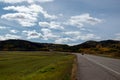 Back country road on the Canadian prairies in fall Royalty Free Stock Photo