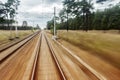 Back Door Train View. Landscape in Motion