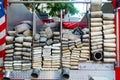 Back of a fire truck with many tubes of water hose with American